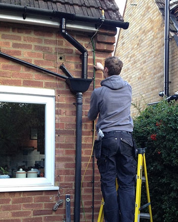 Wiring for outside light on brick wall